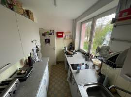 Wohnheimzimmer mit Garten und herzlicher Gemeinschaft