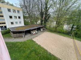Wohnheimzimmer mit Garten und herzlicher Gemeinschaft